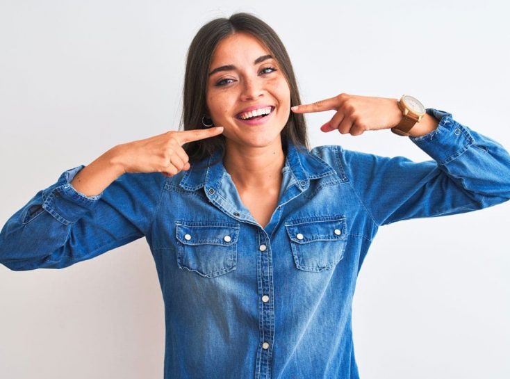 woman-smiling-pointing.jpg